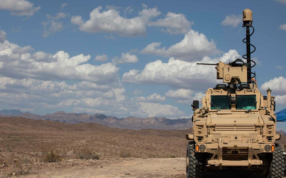 The Next-Generation Combat Vehicle Mine-Resistant Ambush Protected surrogate conducts a live-fire exercise during the Project Convergence capstone event at Yuma Proving Ground, Arizona, Aug. 11 - Sept. 18, 2020. 