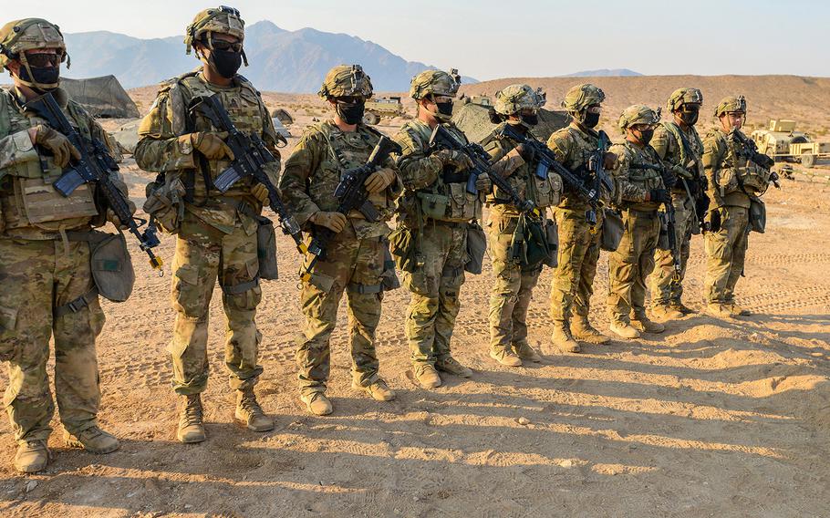 Soldiers with the Army's 1st Infantry Division train during a rotation at the National Training Center at Fort Irwin, Calif., on Sept. 19. The Fort Riley, Kan.-based soldiers were training for operations against a near-peer adversary even as the coronavirus stretched on. 
