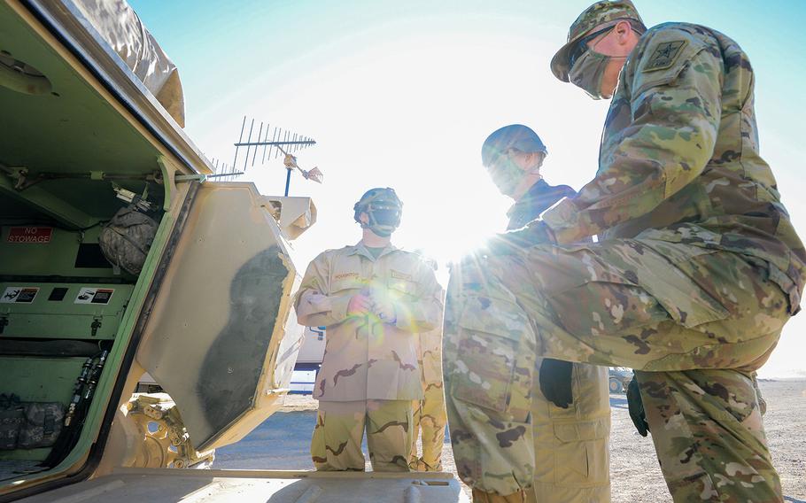 Army Gen. Joseph Martin, the service's vice chief of staff, inspects an armored vehicle Sept. 20 at the National Training Center at Fort Irwin, Calif., which the installation's dedicated opposing force soldiers with the 11th Armored Cavalry Regiment use to portray a near-peer adversary platform. Martin traveled to NTC to view training at the desert post as the coronavirus pandemic continued. 