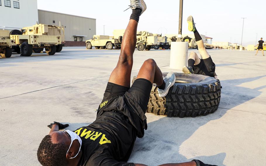 1st Armored Division soldiers from the 4th Battalion, 70th Armor Regiment, 1st Brigade Combat Team perform single-leg hipups during an early-morning Holistic Health and Fitness (H2F) physical training session on at Fort Bliss, Texas, Aug. 21, 2020.
