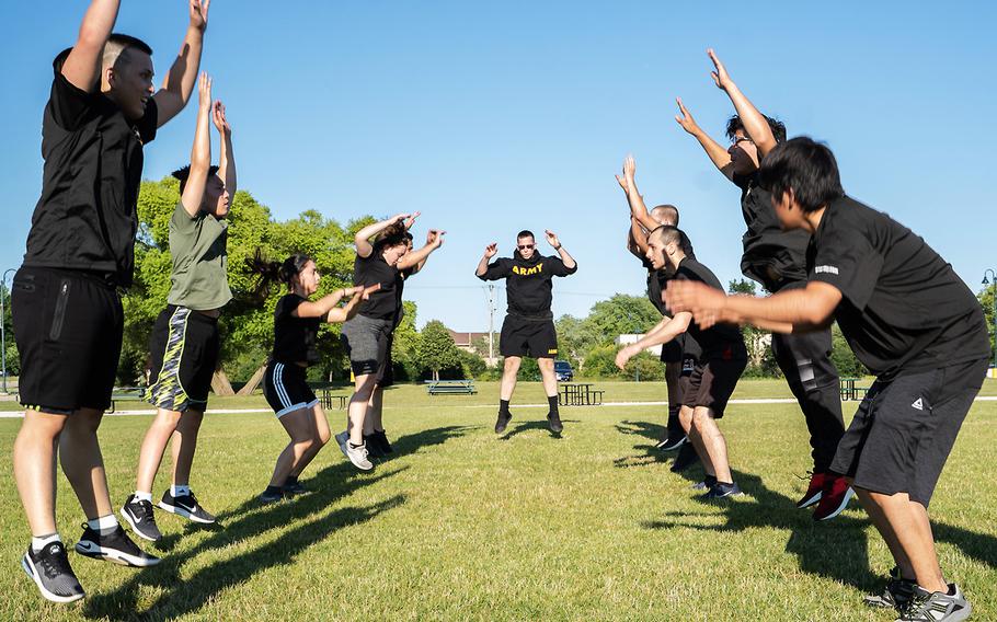 Staff Sgt. Dustin Wells, a recruiter with the Greenfield Recruiting Center, Milwaukee Company, leads future soldiers in physical exercise on Aug. 6, 2020. Recruiters help train those who are preparing to ship off to basic training by introducing them to Army customs and traditions like physical fitness.