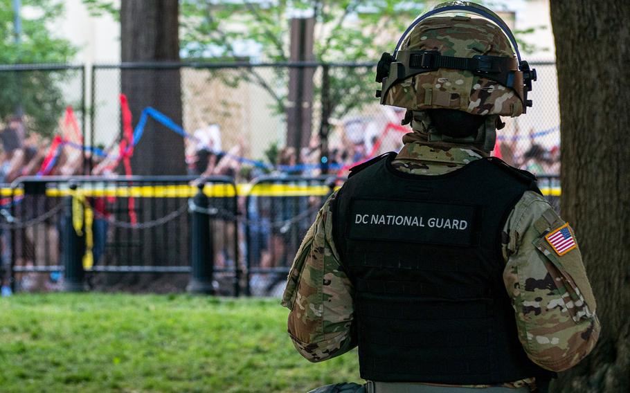 A District of Columbia National Guard soldier observes the Lafayette Park protest in Washington, D.C. on June 2, 2020. 