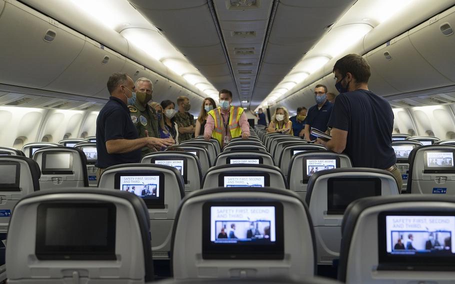 David Silcott, chief executive of S3i, a biological research company, discusses airflow particle testing on board a United Airlines 767 aircraft at Dulles International Airport, Va., on Aug. 28, 2020. The test data released Thursday shows the possible spread of the coronavirus among passengers is low and could help determine future processes for loading and quarantining passengers.