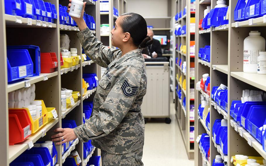 Tech. Sgt. Thesia Westmoreland, non-commissioned officer in charge of pharmacy operations with the 72nd Medical Support Squadron, pulls medications to fill prescriptions at the 72nd Medical Group Pharmacy at Tinker Air Force Base in Oklahoma.
