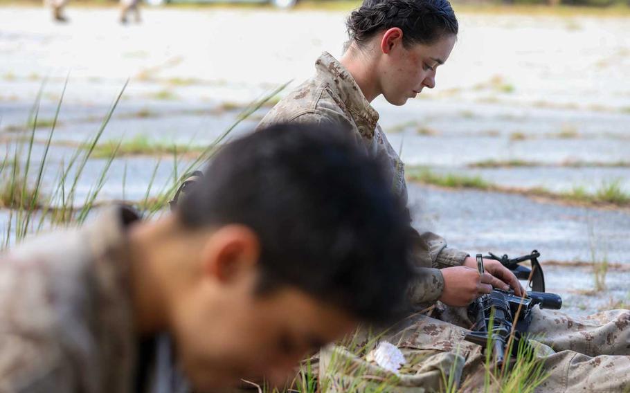 Recruits with Oscar Company, 4th Recruit Training Battalion, clean their rifles during the crucible on Marine Corps Recruit Depot Parris Island, S.C., Sept 24, 2020. The University of Pittsburgh is conducting a study to determine the best way for the Marine Corps to approach gender integration at its two boot camps, the service announced on Oct. 20, 2020.