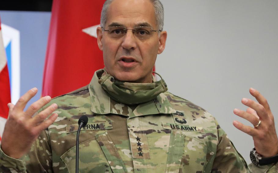 In a July, 2020 photo, Gen. Gus Perna, commander of the Army Materiel Command, speaks at a ceremony at Redstone, Ala.