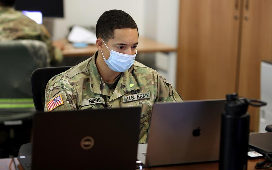 Sgt. Micheal Gibbs, a cybersecurity analyst with the North Carolina Army National Guard's 883rd Combat Engineer Company, monitors networks Nov. 2, 2020, while assisting the Cyber Security Response Force in their support of the State Board of Elections prior to the 2020 Presidential Election. 