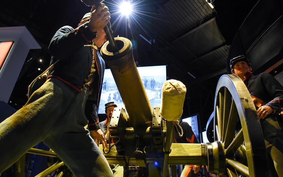 Cast figures of U.S. Army artillerymen during from the Civil War man a 12-pounder Napoleon cannon in the National Museum of the United States Army's Preserving the Nation Gallery. The cannon is an actual artifact from the Battle of Gettysburg. 
