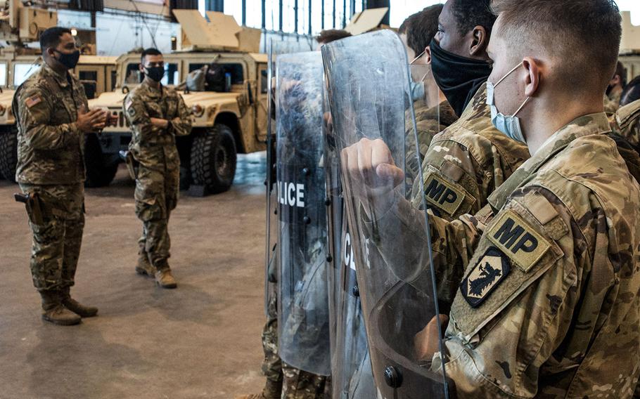 In a Nov. 2, 2020 photo, military police with the Illinois National Guard stage within the McCormick Place as part of Operation Civil Disturbance Response III. Nearly 400 soldiers and airmen were activated to stand ready to support civil authorities in the event of widespread unrest.