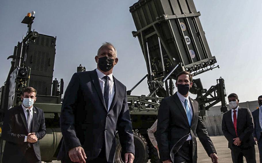 Then-Defense Secretary Mark Esper tours an Iron Dome display with Israeli Defense Minister Benny Gantz in Tel Aviv, Israel, Oct. 29, 2020.