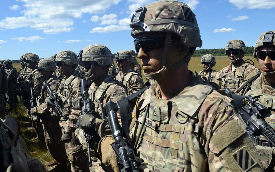 Soldiers from the 3rd Infantry Division stand in formation during opening ceremonies of an exercise at Drawsko Pomorskie Training Area, Poland in 2016.The U.S. armed forces were rated "marginal" in strength in an annual report by the conservative Heritage Foundation, despite America spending more on its military than the next 10 countries combined. 
