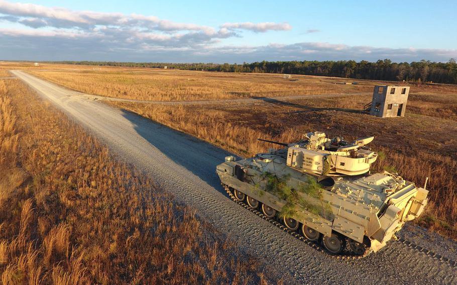 A Bradley Fighting Vehicle from the 1st Armored Brigade Combat Team, 3rd Infantry Division, conducts a gunnery exercise at Fort Stewart, Ga., Dec. 7, 2016. The Army is about to publish its new solicitation for an Optionally Manned Fighting Vehicle, which is expected to start replacing the Bradley in 2028.

