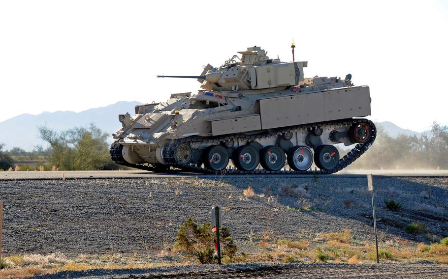 The Army tests advanced running gear for potential use on the future Optionally Manned Fighting Vehicle at U.S. Army Yuma Proving Ground, Ariz., in January 2020. The Army is about to publish its new solicitation for the vehicle.

