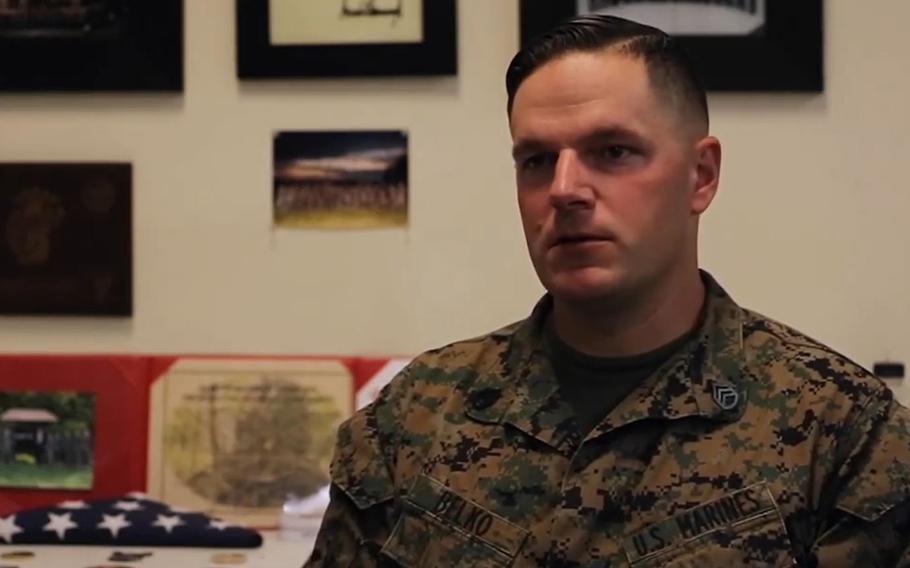 Staff Sgt. Jeffrey Belko, shown here in a video screenshot, was the guard duty officer at Marine Barracks Washington in Washington, D.C., when a woman was hit by a car and remained trapped underneath on Nov. 7, 2020. Belko and other Marines used jacks to help lift the car off the woman.