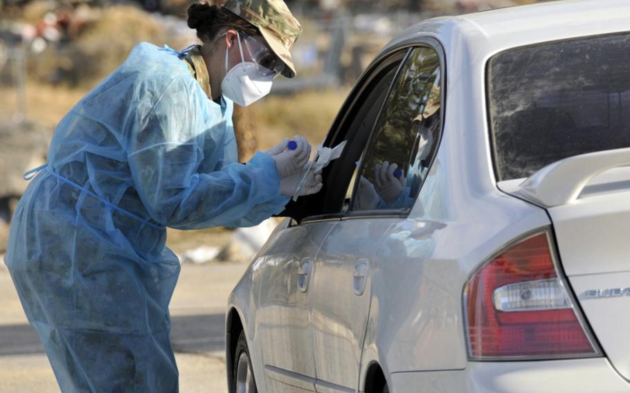 A Nevada Guard Airman supports the Reno-Sparks Indian-Colony in Hungry Valley, Nevada, on Nov. 12. Since the beginning of the Nevada National Guard’s coronavirus health response support in April, task forces have provided assistance at 10 tribal locations across Nevada with food distribution support and medical and logistical support for virus testing.