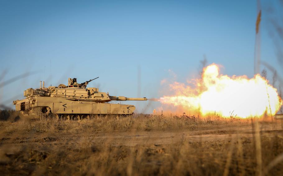 An M1 Abrams tank fires its main gun during a live fire exercise at Pabrade Training Area, Lithuania, Dec. 10, 2020. The Army has awarded a $4.6 billion contract to contractor General Dynamics Land Systems for a modernized version of the tank to be produced through 2028. 

