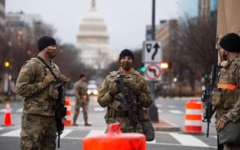 Members of the Pennsylvania National Guard's 2nd Battalion, 112th Infantry Regiment help provide security at a check point on New Jersey Ave. on the North side of the U.S. Capitol in Washington D.C., on Saturday, Jan. 16, 2021. 