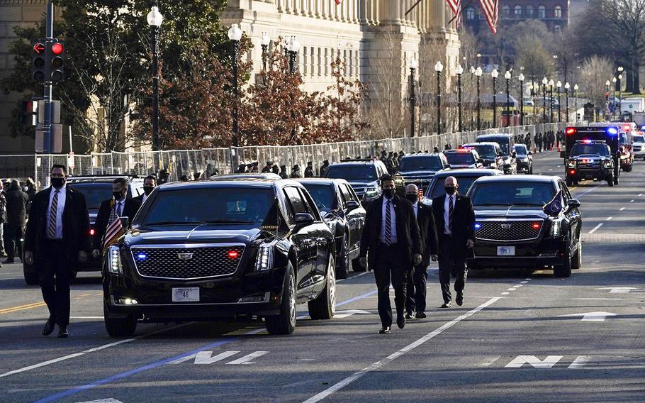 The Presidential motorcade drives through Washington, D.C., during Inauguration Day ceremonies Wednesday, Jan. 20, 2021.