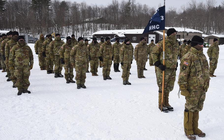 Soldiers with Headquarters Company, 3rd Battalion, 172nd Infantry, stand at attention during a sendoff ceremony Jan. 29, 2021, at the Camp Ethan Allen Training Site parade field in Jericho, Vt. The 3-172nd, part of the Vermont National Guard's 86th Infantry Brigade Combat Team (Mountain), will deploy to the U.S. Central Command area of operations for about a year starting in February.