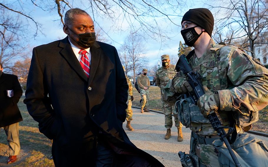 Secretary of Defense Lloyd Austin visits National Guard troops deployed at the U.S. Capitol and its perimeter, Friday, Jan. 29, 2021 on Capitol Hill in Washington.