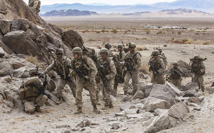 Marines with 2nd Battalion, 3rd Marine Regiment, 3rd Marine Division advance to their objective during training at Marine Corps Air Ground Combat Center at Twentynine Palms, Calif., on Feb. 1, 2021.