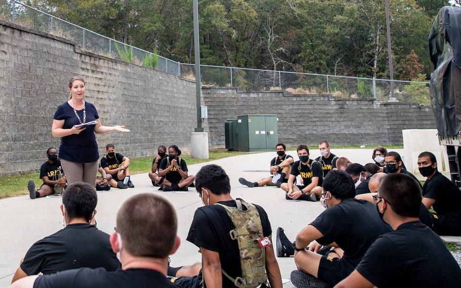 Dr. Treva Anderson gives trainees with the 3rd Battalion, 34th Infantry Regiment a briefing on mindfulness training on Oct. 28, 2020. The Army is evaluating whether a pilot program incorporating yoga and mindfulness meditation affected factors such as physical performance and stress management.

