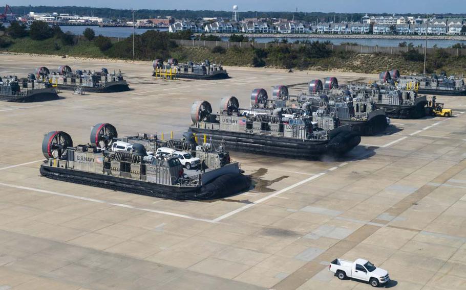 Service members from Joint Task Force Civil Support and Assault Craft Unit 4 move vehicles from Joint Expeditionary Base Little Creek-Fort Story to Fort Eustis on Sept. 16, 2019, during a mobile exercise. A sailor assigned to Assault Craft Unit 4 based at Joint Expeditionary Base Little Creek in Virginia Beach is the fourth sailor to die in February from the coronavirus, the Navy announced Tuesday.