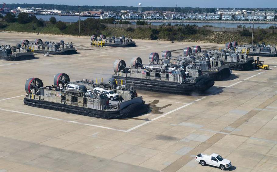 Service members from Joint Task Force Civil Support and Assault Craft Unit 4 move vehicles from Joint Expeditionary Base Little Creek-Fort Story to Fort Eustis on Sept. 16, 2019, during a mobile exercise. A sailor assigned to Assault Craft Unit 4 based at Joint Expeditionary Base Little Creek in Virginia Beach is the fourth sailor to die in February from the coronavirus, the Navy announced Tuesday.

