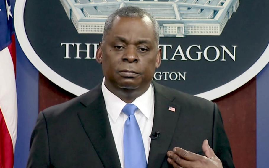 Defense Secretary Lloyd Austin speaks to service members about the coronavirus vaccine in this screenshot of a video released by the Pentagon, Wednesday, Feb. 24, 2021.