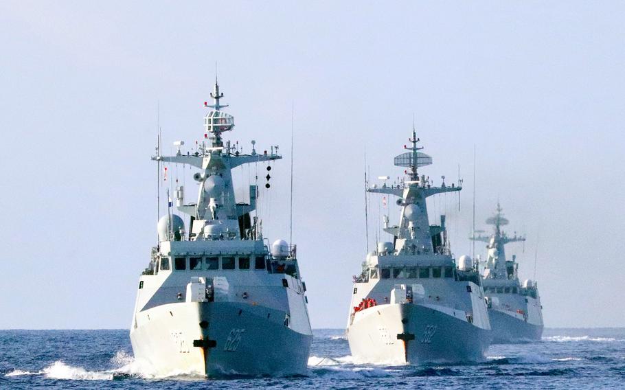 Three Chinese warships steam in formation during a training exercise in the South China Sea on Jan. 4, 2021. China spent the second most on defense worldwide, after the U.S., according to an International Institute for Strategic Studies report released Feb. 25, 2021.    
 
 
 
 
 
 