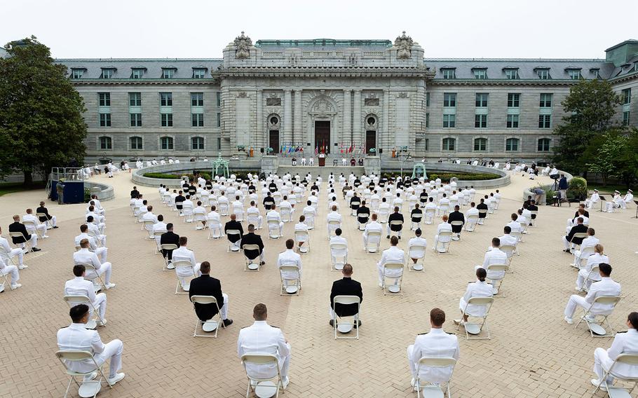In a May 18, 2020 photo, the United States Naval Academy holds the fourth swearing-in event for the Class of 2020.