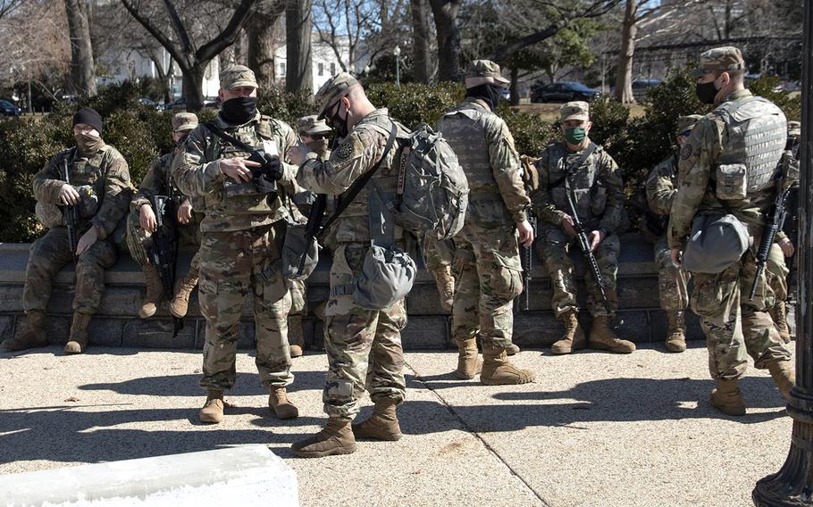 National Guard soldiers wait near the U.S. Capitol on March 3, 2021.