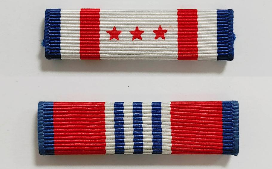 The District of Columbia National Guard Presidential Inauguration Support Ribbon, top, and the District of Columbia Emergency Service Ribbon. The D.C. National Guard plans to award at least one of two ribbons to all soldiers and airmen who supported the security mission before, during and after the 59th presidential inauguration in recognition of their service.