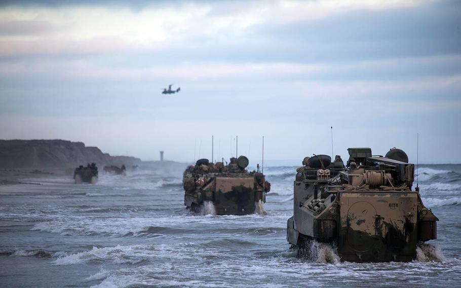 Marines with Bravo Company, Battalion Landing Team 1/4, 15th Marine Expeditionary Unit, drive assault amphibious vehicles at Marine Corps Base Camp Pendleton, Calif., July 14, 2020. 