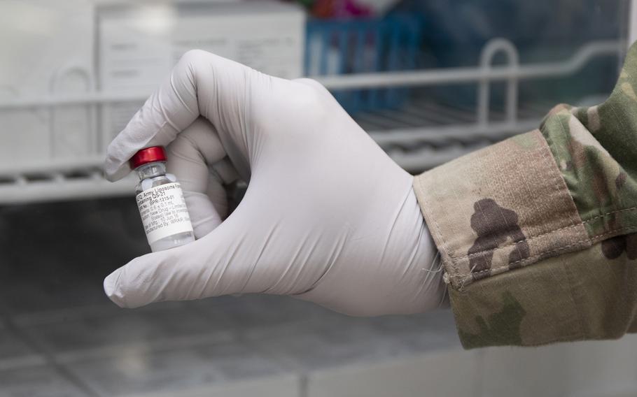A vial of Army liposome formulation Q (ALF Q) is stored during the start of phase I clinical trials for the Walter Reed Army Institute of Research's COVID-19 vaccine. ALF Q is an adjuvant, or compound used to boost the immune response, that is co-administered with the vaccine.
