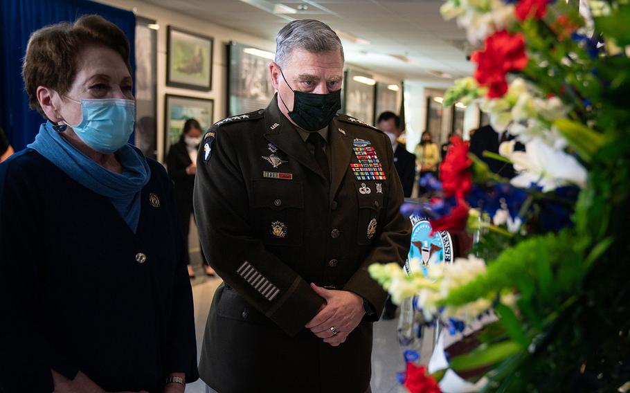 Army Gen. Mark A. Milley, chairman of the Joint Chiefs of Staff, pays respects on Wednesday, April 7, 2021, at the Pentagon during the Defense POW/MIA Accounting Agency (DPAA) ceremony commemorating the 20th Anniversary of a helicopter crash in Vietnam.