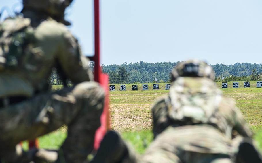 Army snipers eye targets down range during the heartbreaker event on the first day of the service's Best Sniper competition on Monday, April 12, 2021 at Fort Benning, Ga. 