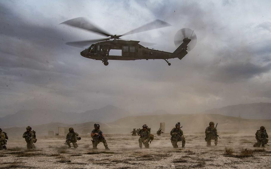 U.S. service members secure the perimeter at an undisclosed location in Afghanistan in March 2020. President Joe Biden formally announced Wednesday, April 14, 2021, that the U.S. will remove the remaining 2,500 or so U.S. troops from Afghanistan by Sept. 11, 2021.
