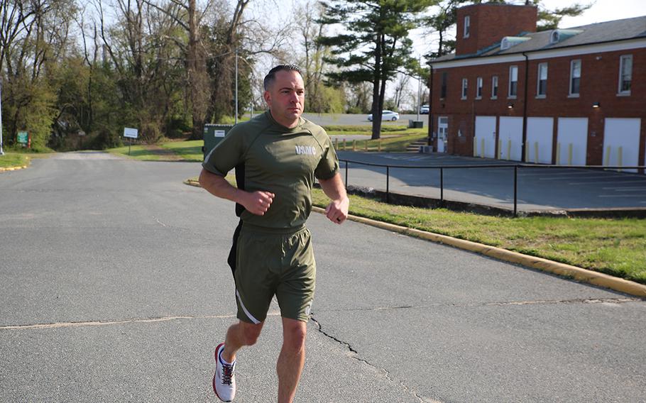 A Marine demonstrates a prototype version of the new Physical Training Uniform. The new shirt and shorts will be tested and evaluated by 500 Marines. The uniform will provide a more athletic fit that aligns with today’s commercial clothing trends. 