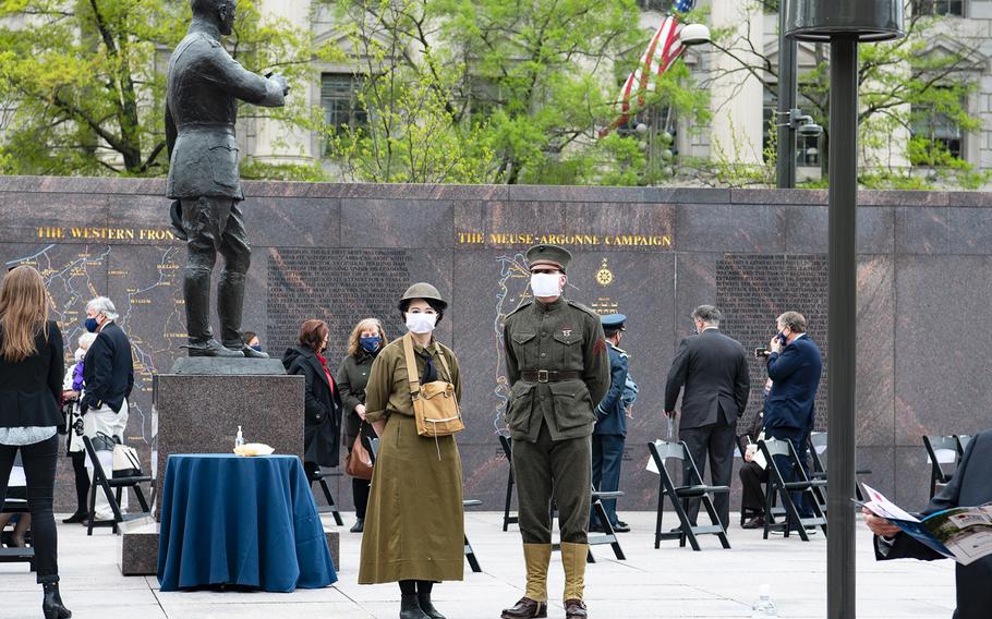 Marine veteran Chris Kuhns with his wife Gabrielle stand dressed in World War I-era uniforms on Friday, April 16, 2021, just prior to a dedication ceremony for the new WWI Memorial in Washington, D.C., just a block from the White House grounds.