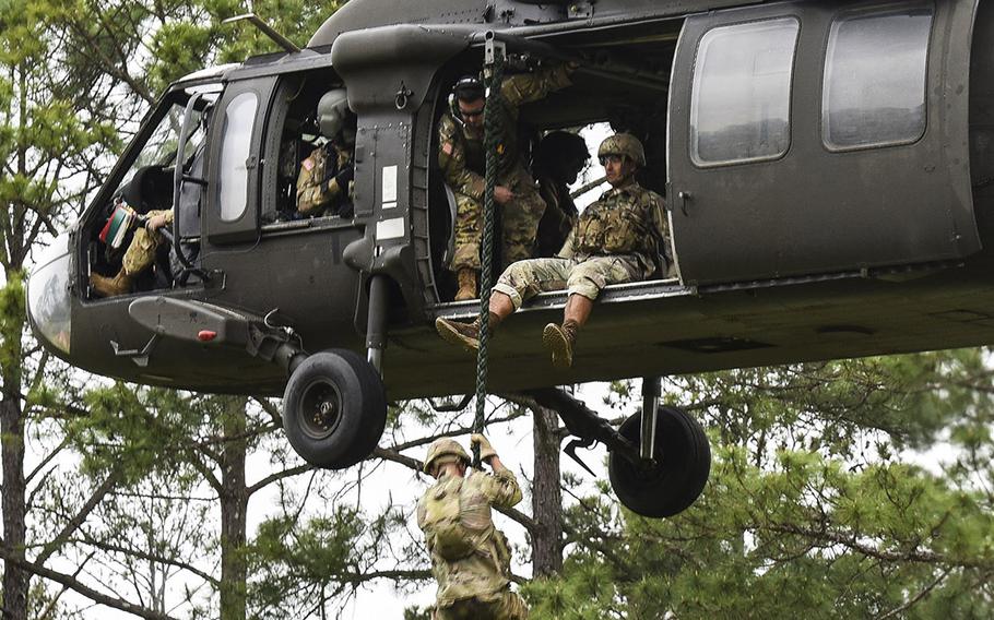 Soldiers compete in the 2021 Best Ranger competition at Fort Benning, Ga. on Friday, April 16. The three-day contest, considered among the Army's most grueling challenges, returned this year after the coronavirus pandemic forced its cancellations in 2020.