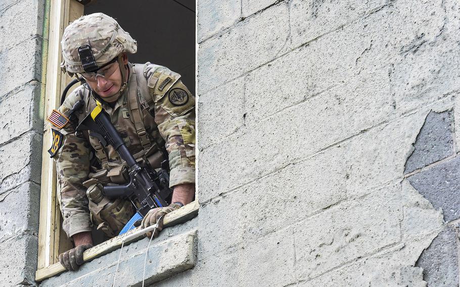 Soldiers compete in the 2021 Best Ranger competition at Fort Benning, Ga. on Friday, April 16. The three-day contest, considered among the Army's most grueling challenges, returned this year after the coronavirus pandemic forced its cancellations in 2020.