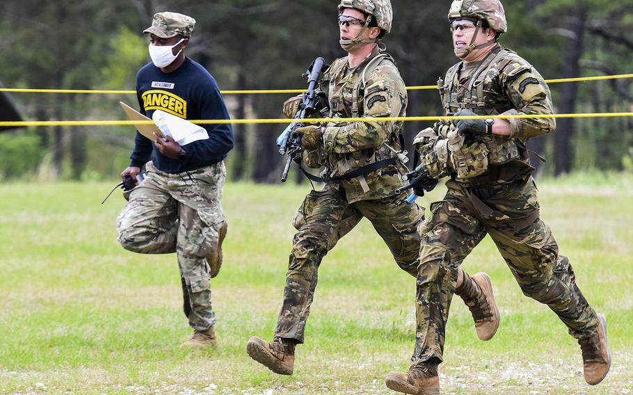 Soldiers compete in the 2021 Best Ranger competition at Fort Benning, Ga. on Friday, April 16. The three-day contest, considered among the Army's most grueling challenges, returned this year after the coronavirus pandemic forced its cancellations in 2020.