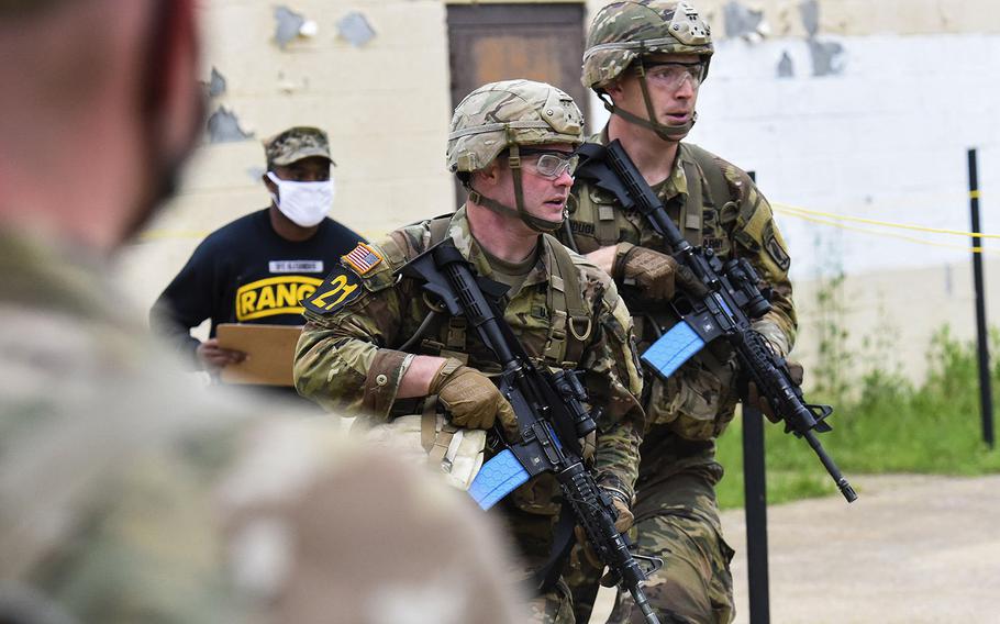 Soldiers compete in the 2021 Best Ranger competition at Fort Benning, Ga. on Friday, April 16. The three-day contest, considered among the Army's most grueling challenges, returned this year after the coronavirus pandemic forced its cancellations in 2020.