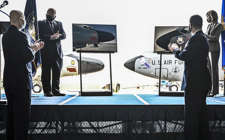 Mayor Rusty Hike of Bellevue, Nebraska, unveils the new nose art in homage to the old Lincoln Air Force Base with Mayor Leirion Gaylor Baird of Lincoln, Nebraska, April 16, 2021, at the Nebraska National Guard air base in Lincoln. The 55th Wing will be relocated in Lincoln during runway renovations at Offutt Air Force Base for the next 18 months.