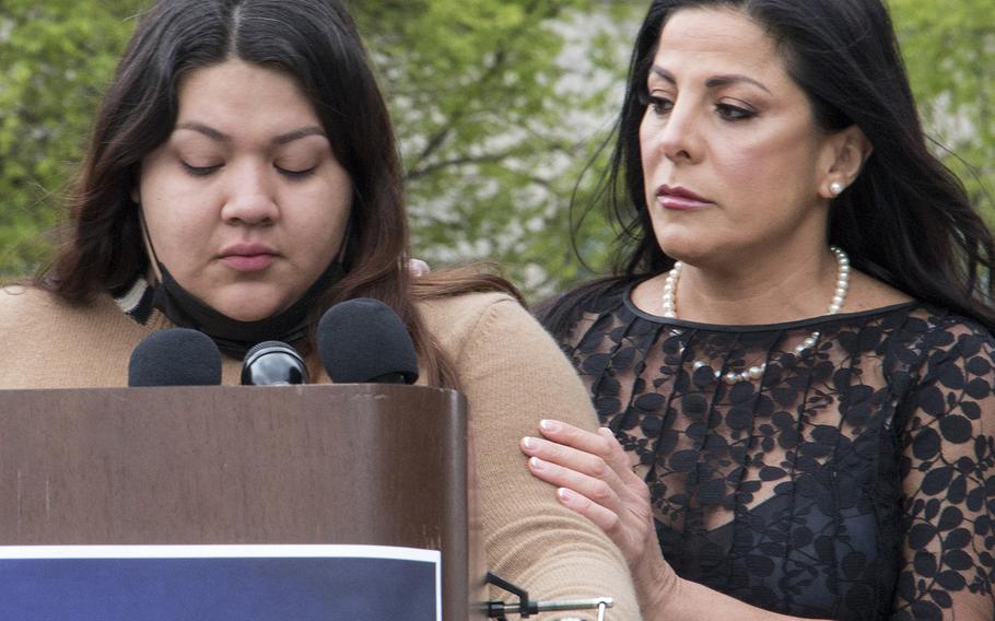 Spc. Vanessa Guillen's sister Mayra, left, is comforted by family attorney Natalie Khawam during a news conference marking the first anniversary of the Fort Hood soldier's killing, April 22, 2021, at the Navy Memorial in Washington, D.C.