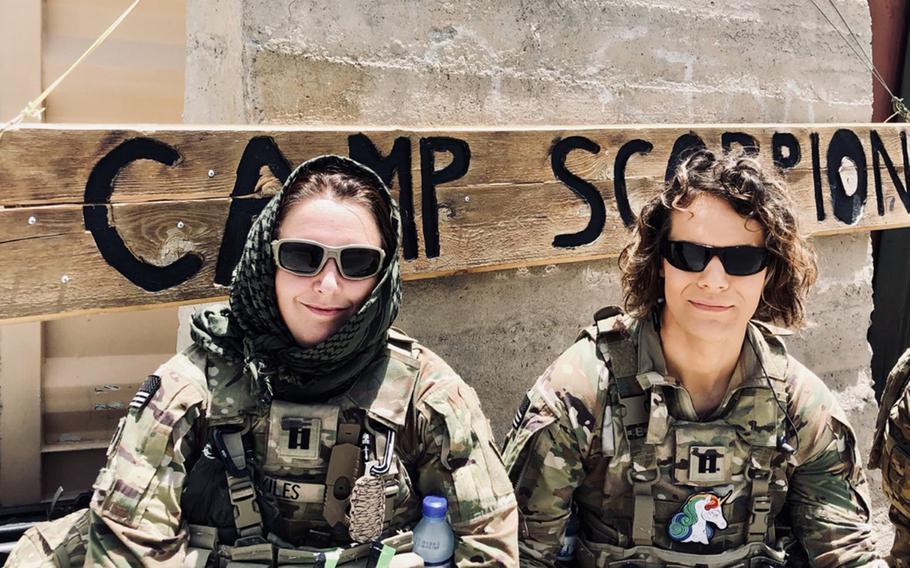 Then-Capt. Alivia Stehlik, right, a transgender service member, and Capt. Sara Skiles deployed to Afghanistan in 2018. A reversal of a ban by the Trump administration on transgender troops serving in the military took effect April 30, 2021. 
