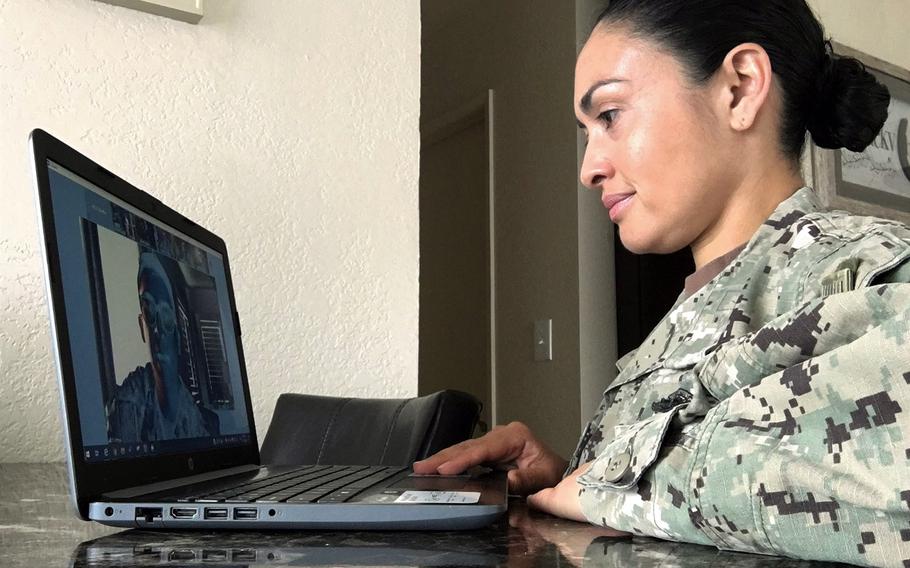 In a May 16, 2020 photo, Mass Communication Specialist 2nd Class Natalia Murillo participates in a video conference with Navy Public Affairs Support Element (NPASE) West during a drill weekend. NPASE reserve units paused in-person drills as early as March in accordance with Navy-wide coronavirus precautions.