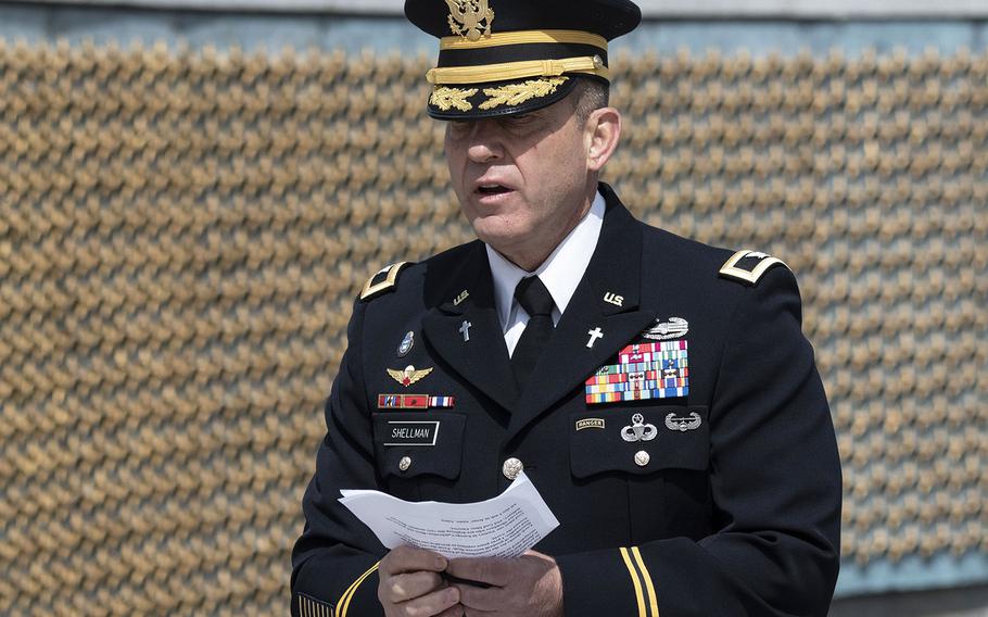 Chaplain (Col.) Michael Shellman, the Military District of Washington's command chaplain, delivers the invocation during a ceremony at the National World War II Memorial in Washington, D.C. on May 8, 2021, the anniversary of the end of the war in Europe.