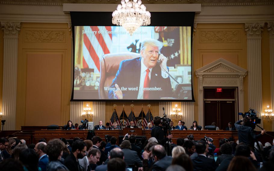 An image of President Donald Trump is displayed on a screen as the House Select Committee to Investigate the January 6th Attack on the United States Capitol conducts its final hearing in the Cannon House Office Building on Monday, Dec. 19, 2022, in Washington, D.C.